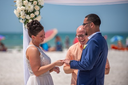 Perfect beach wedding with Gulf Beach Weddings and Louis Photography.
